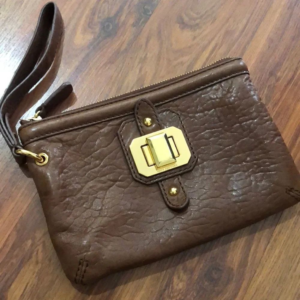 Juicy couture brown leather wristlet.